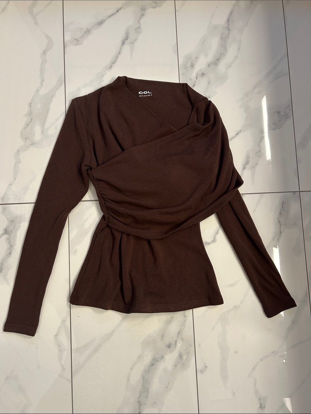 OGL asymmetrical brown top